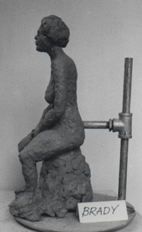seated woman sculpture
